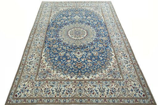 Surface texture of 2000s Nain rug with natural Wool and intricate pattern