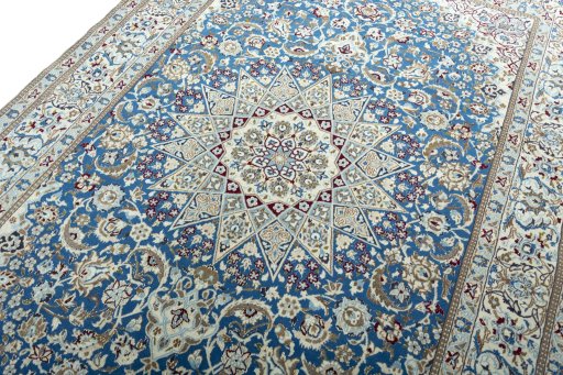 Backside of handmade 2000s Nain rug showing knot structure and weave density
