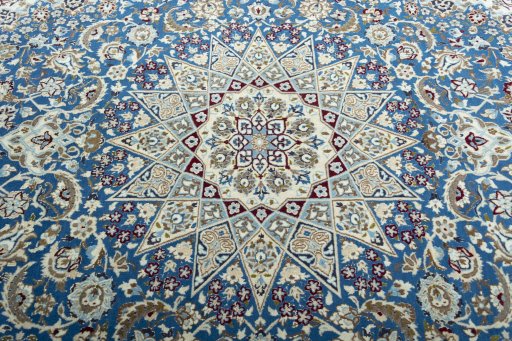 Central medallion detail of 2000s Nain rug from Iran / Persia