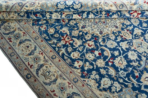 Close-up detail of 2000s Nain rug from Iran / Persia showing Wool weave