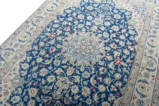 Backside of handmade 2000s Nain rug showing knot structure and weave density