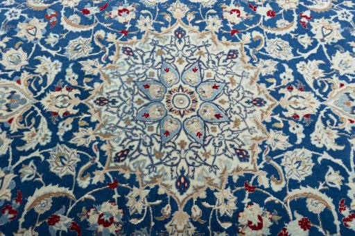 Central medallion detail of 2000s Nain rug from Iran / Persia