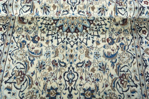 Close-up detail of 2000s Nain rug from Iran / Persia showing Wool weave