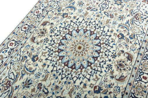 Backside of handmade 2000s Nain rug showing knot structure and weave density