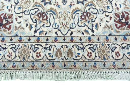 Full view of 2000s Nain rug from Iran / Persia, 198 × 115 cm in Beige tones