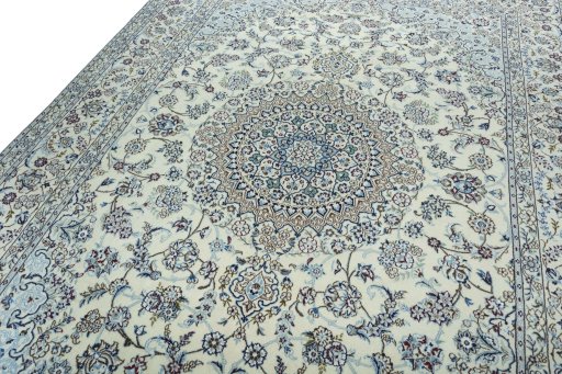 Backside of handmade 2000s Nain rug showing knot structure and weave density