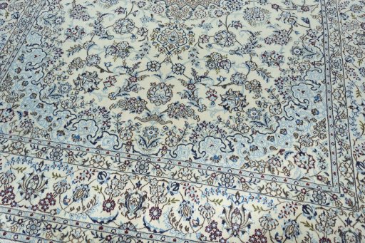Close-up detail of 2000s Nain rug from Iran / Persia showing Wool weave