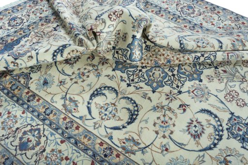 Surface texture of 2000s Nain rug with natural Wool and intricate pattern