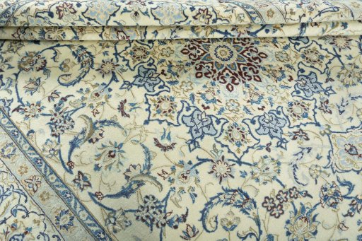 Close-up detail of 2000s Nain rug from Iran / Persia showing Wool weave