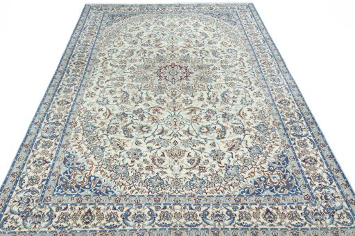 Surface texture of 2000s Nain rug with natural Wool and intricate pattern