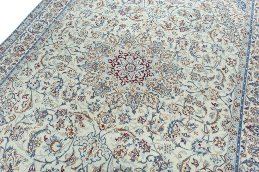 Backside of handmade 2000s Nain rug showing knot structure and weave density