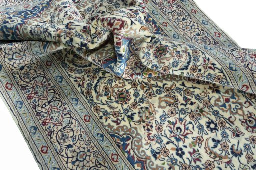 Close-up detail of 2000s Nain rug from Iran / Persia showing Wool weave