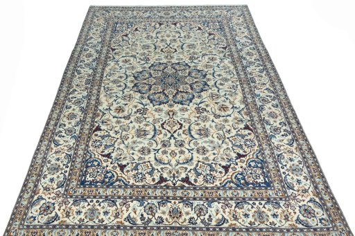 Surface texture of 2000s Nain rug with natural Wool and intricate pattern