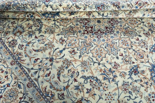 Close-up detail of 2000s Nain rug from Iran / Persia showing Wool weave