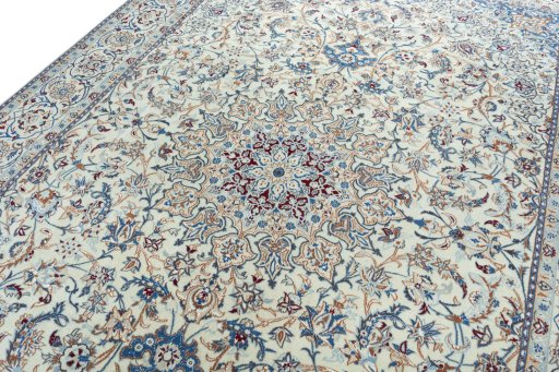 Backside of handmade 2000s Nain rug showing knot structure and weave density