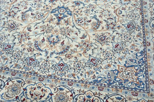 Close-up detail of 2000s Nain rug from Iran / Persia showing Wool weave