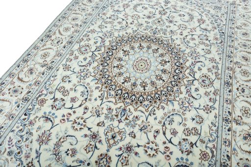 Backside of handmade New Nain rug showing knot structure and weave density