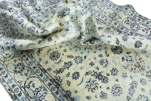 Surface texture of New Nain rug with natural Wool and intricate pattern