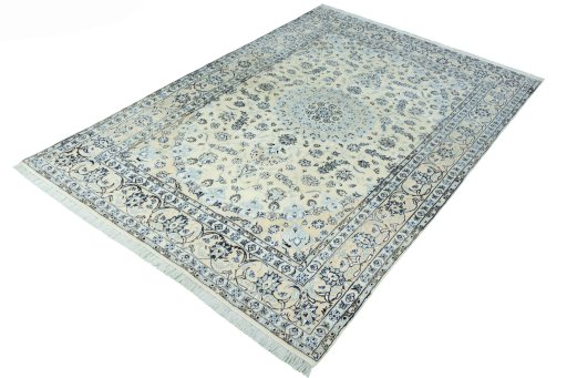 Corner detail of New Nain rug showing border pattern and Wool pile