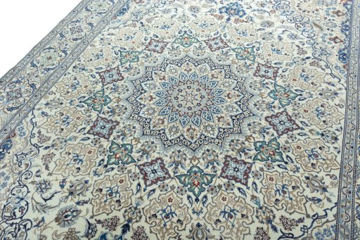 Backside of handmade 2000s Nain rug showing knot structure and weave density