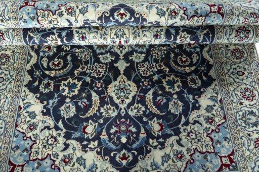 Close-up detail of 2000s Nain rug from Iran / Persia showing Wool weave