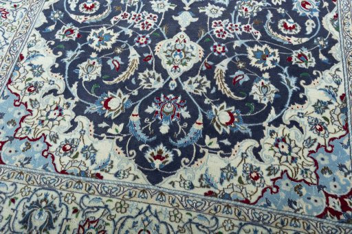 Close-up detail of 2000s Nain rug from Iran / Persia showing Wool weave