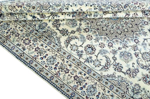 Close-up detail of 2000s Nain rug from Iran / Persia showing Wool weave
