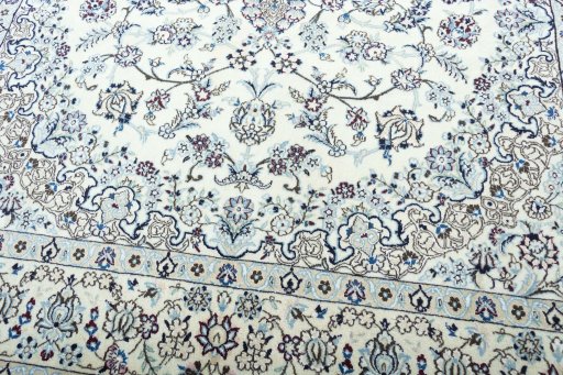 Close-up detail of 2000s Nain rug from Iran / Persia showing Wool weave
