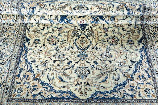 Close-up detail of 2000s Nain rug from Iran / Persia showing Wool weave
