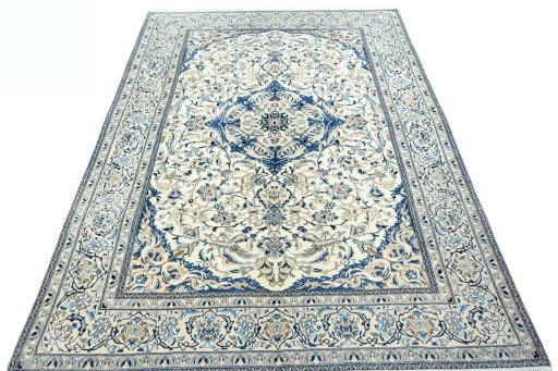 Surface texture of 2000s Nain rug with natural Wool and intricate pattern