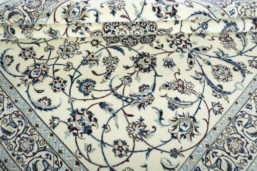 Close-up detail of 2000s Nain rug from Iran / Persia showing Wool weave