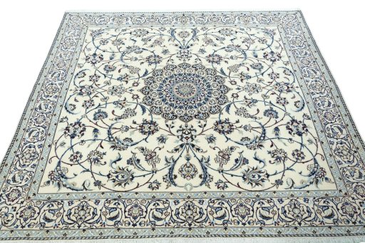 Surface texture of 2000s Nain rug with natural Wool and intricate pattern