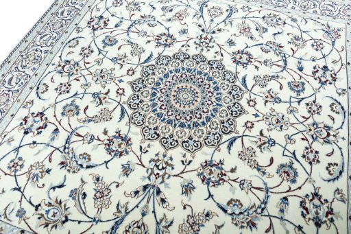 Backside of handmade 2000s Nain rug showing knot structure and weave density