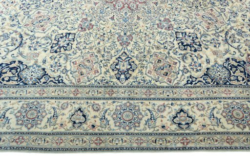 Corner detail of 1970s Nain rug showing border pattern and Wool pile