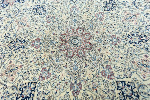 Central medallion detail of 1970s Nain rug from Iran / Persia