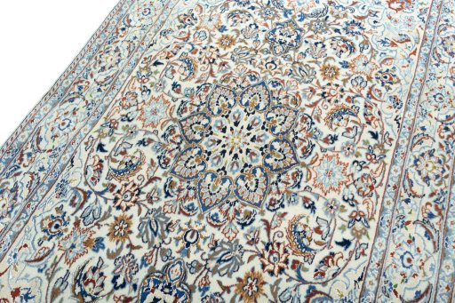 Backside of handmade 2000s Nain rug showing knot structure and weave density