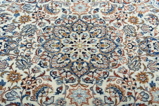 Central medallion detail of 2000s Nain rug from Iran / Persia