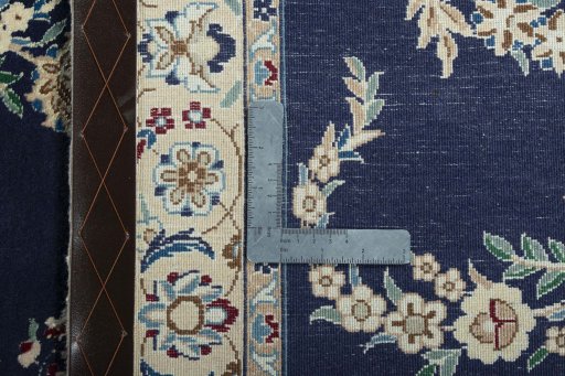 Close-up detail of 2000s Nain rug from Iran / Persia showing Wool weave