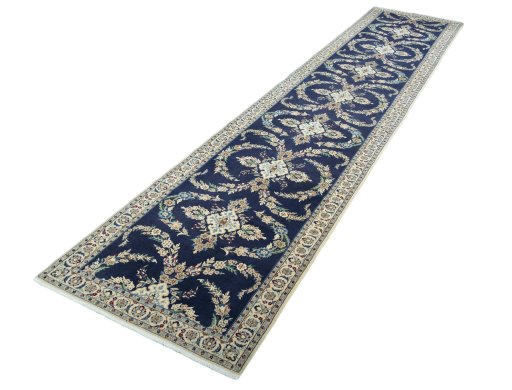 Corner detail of 2000s Nain rug showing border pattern and Wool pile
