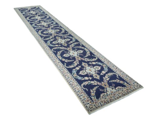Close-up detail of 2000s Nain rug from Iran / Persia showing Wool weave