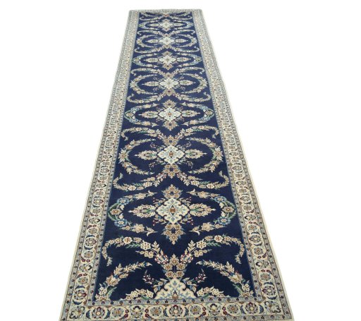 Surface texture of 2000s Nain rug with natural Wool and intricate pattern