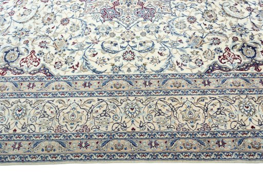 Corner detail of 2000s Nain rug showing border pattern and Wool pile