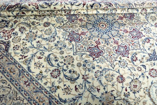 Close-up detail of 2000s Nain rug from Iran / Persia showing Wool weave
