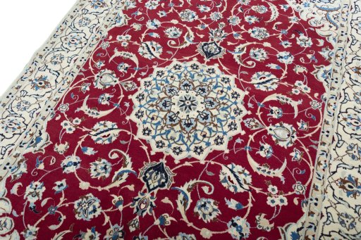 Backside of handmade New Nain rug showing knot structure and weave density