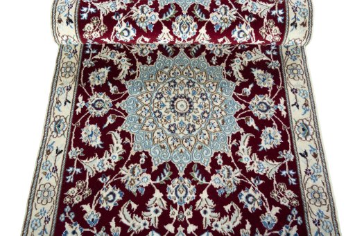Close-up detail of New Nain rug from Iran / Persia showing Wool weave