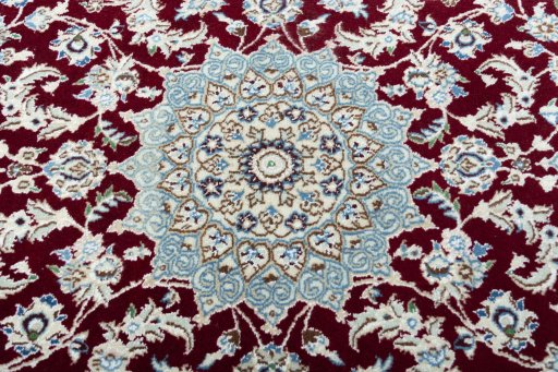 Central medallion detail of New Nain rug from Iran / Persia