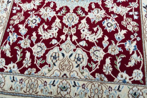 Close-up detail of New Nain rug from Iran / Persia showing Wool weave