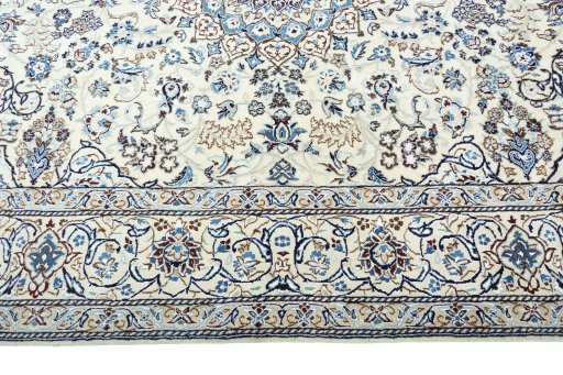 Corner detail of New Nain rug showing border pattern and Wool pile