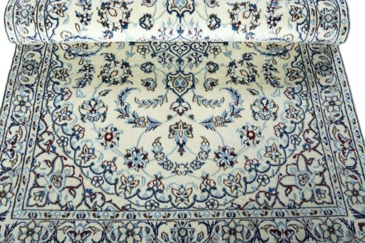 Close-up detail of 2000s Nain rug from Iran / Persia showing Wool weave