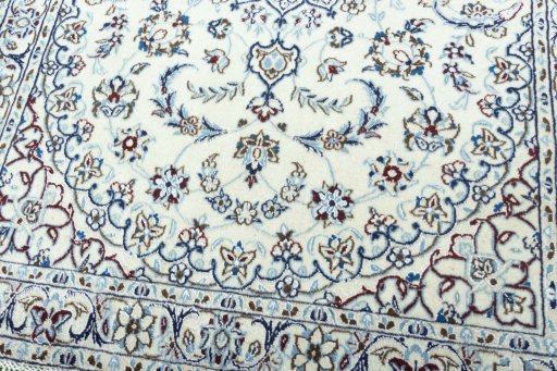 Close-up detail of 2000s Nain rug from Iran / Persia showing Wool weave